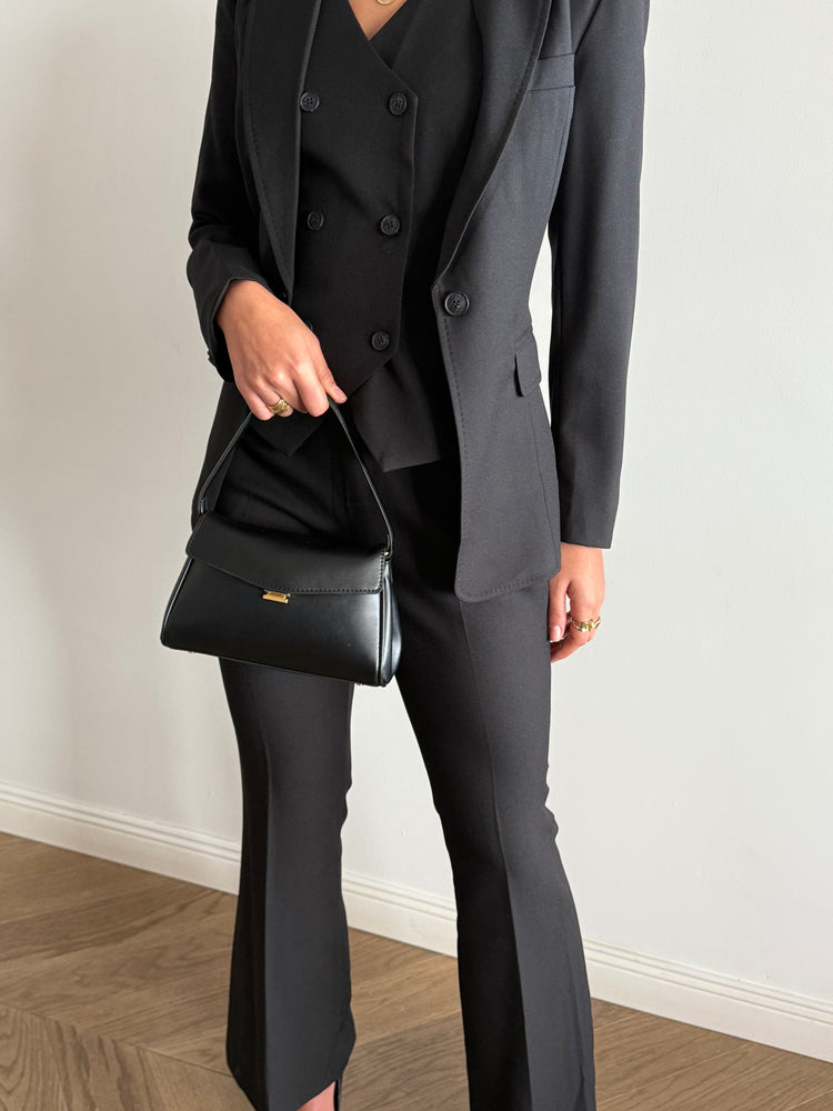 Black three-piece suit