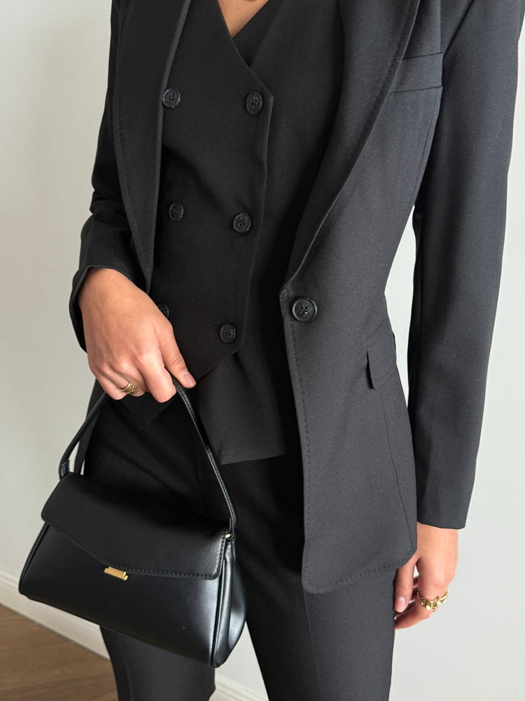 Black three-piece suit