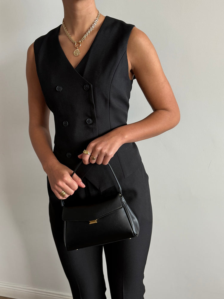 Black three-piece suit