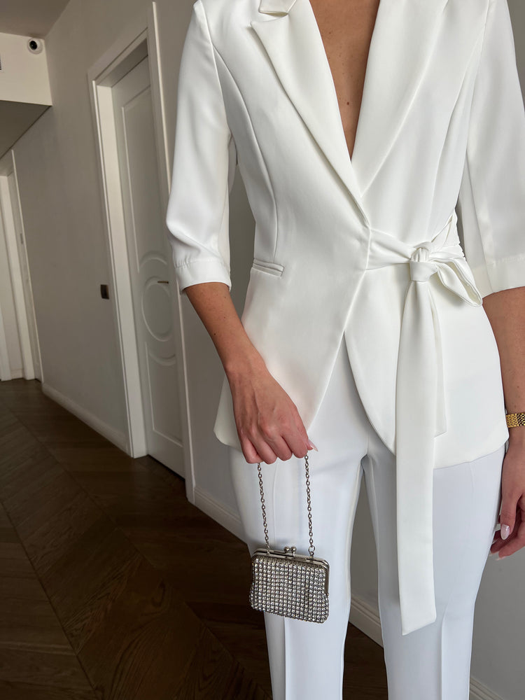 White Cannes suit