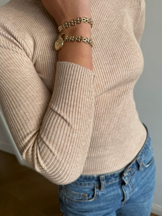Sand turtleneck sweater